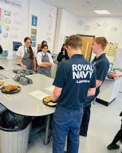 Royal Navy join Year 10 demonstrating their chef skills!
